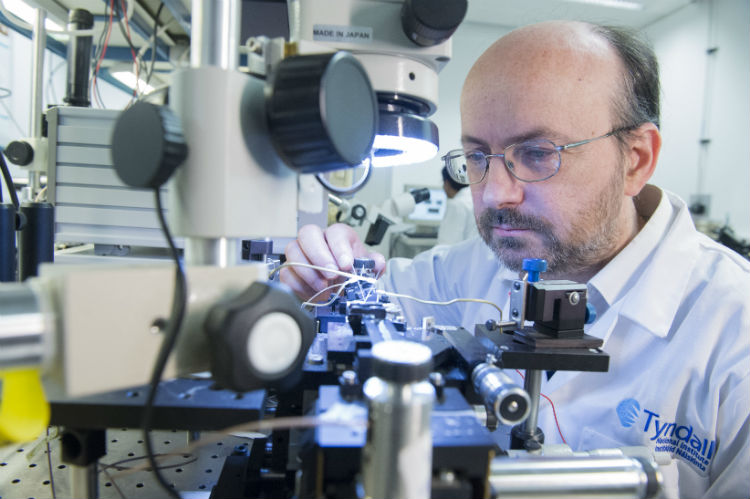 Laser researcher at Tyndall National Institute, Dr. Brendan Roycroft, aligning a new multi-contact tunable laser.